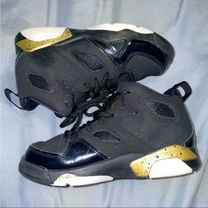 toddler black and gold jordans